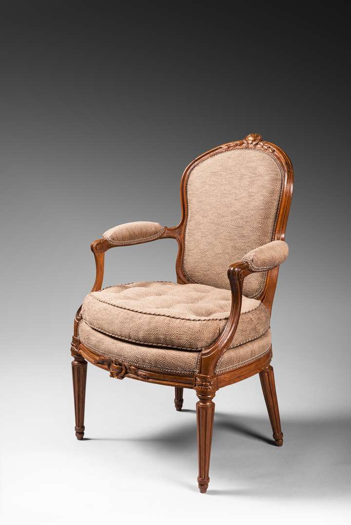 A rare set of ten Transition dining room armchairs
